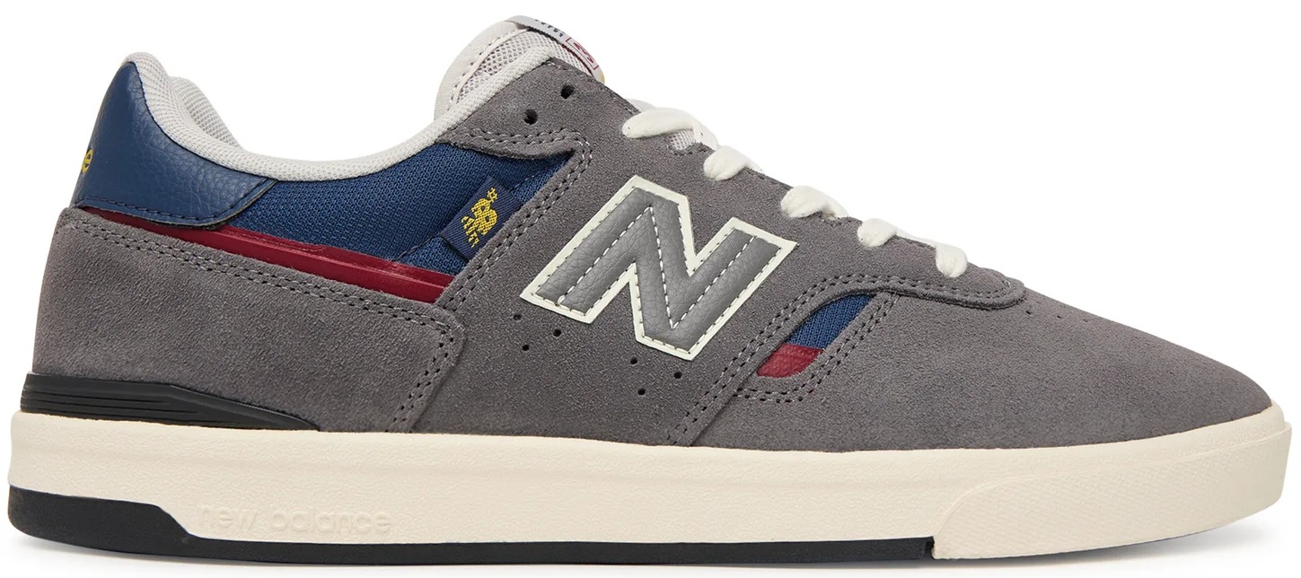 zapatillas-new-balance-un306cyz-gris-00